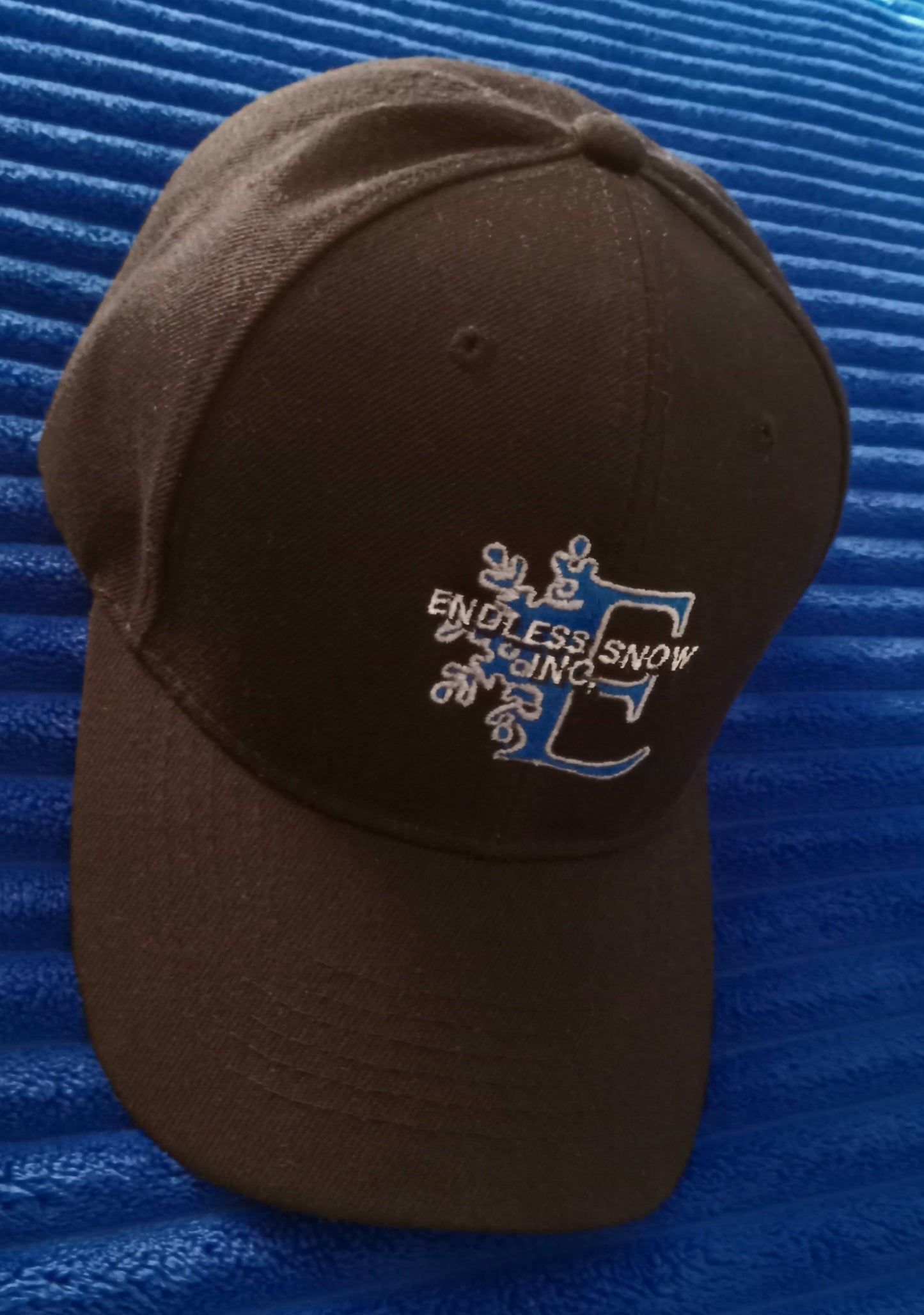 Endless Snow Inc. LLC logo hats